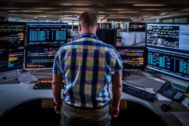 Date:12th September 2018.
Picture James Hardisty.
Rail Operations Centre, near Ashburys station in Manchester. Pictured Signaller Dean Smith.