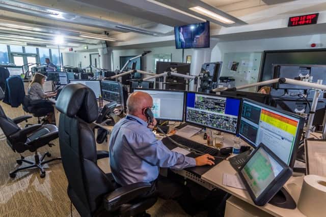 Date:12th September 2018. Picture James Hardisty. Rail Operations Centre, near Ashburys station in Manchester. Pictured: A controller work working at his station.