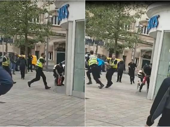 Images of police responding to the incident in King Edward Street, Hull.
