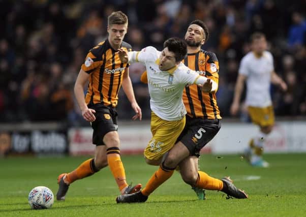 ROLE REVERSAL: Michael Hector, in action for Hull City against Sheffield Wednesday last season. Picture: Steve Ellis