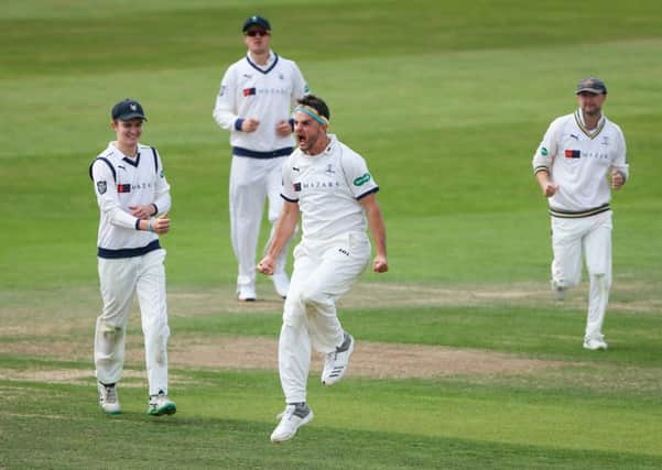 Yorkshire's Jack Brooks celebrates the wicket of Lancashire's Dane Vilas in the first innings at Headingley. Picture: Alex Whitehead/SWpix.com