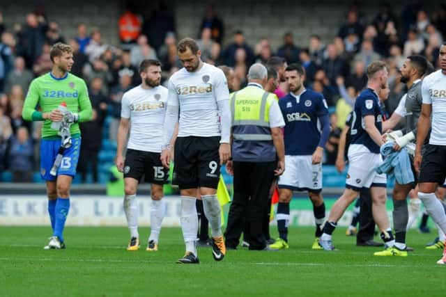 DEAD END: 
Dejected Leeds United players at the end of the match at Millwall last year. Picture: James Hardisty.