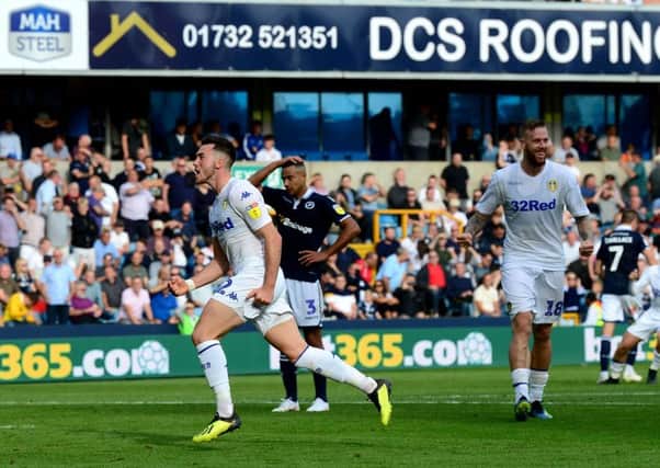Jack Harrison, of Leeds United, celebrates after scoring the equalising goal for Leeds in the 89th minute.