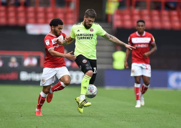 Kieron Freeman of Sheffield United is challenged by Josh Brownhill of Bristol City during the Sky Bet Championship match at Ashton Gate Stadium, Bristol. Picture date 15th September 2018. Picture credit should read: Robin Parker/Sportimage