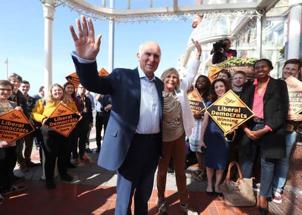 Lib Dem leader Sir Vince Cable arrives at his party's conference in Brighton.