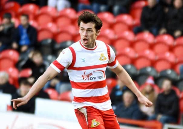 Spot on:  Doncaster's John Marquis.