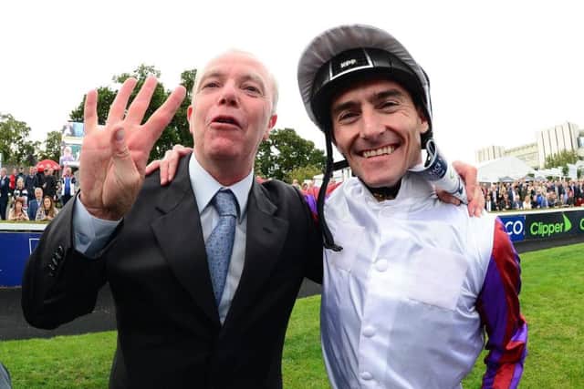 Karl Burke celebrates the fourth Group One success of Laurens with jockey Danny Tudhope who replaced the horse's regular rider, the injury sidelined PJ McDonald, in the saddle.