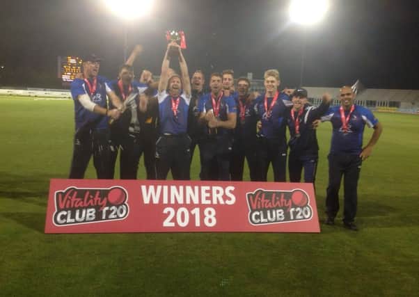 Hanging Heaton celebrate with the Vitality National Club T20 trophy
