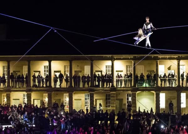 HIGH ANXIETY: Chris Bullzini recreates a high wire performance from 1861 when the King of the tightrope Charles Blondin. PIC: PA