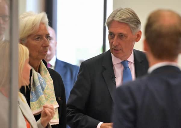 Chancellor Philip Hammond and International Monetary Fund (IMF) managing director Christine Lagarde at a press conference to mark the publication of the 2018 Article IV assessment of the UK at the Treasury.