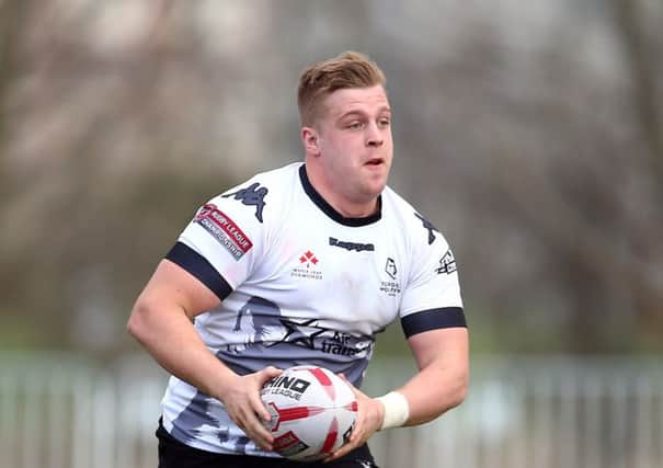 CHARGED: Toronto Wolfpack's Jack Bussey, in action against the Swinton Lions. Picture: Vaughn Ridley/SWpix.com