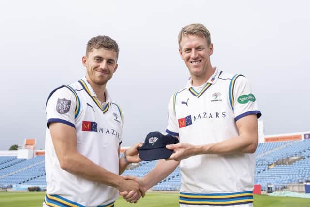 Yorkshire's Ben Coad receives his county cap from captain Steven Patterson prior to the match against Hampshire. (Picture: SWPix.com)