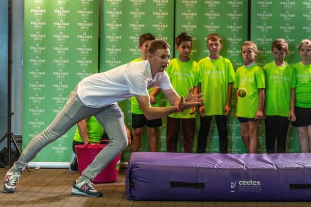 England cricket captain Joe Root helped to launch a nationwide 'Village Green' community volunteering project by the Village Hotel Club, Morley. Picture: James Hardisty.