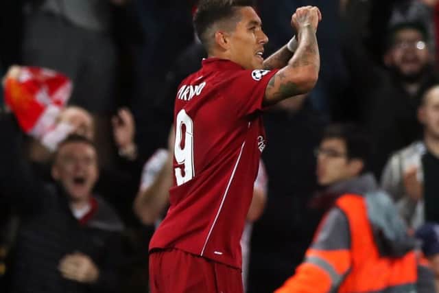 Liverpool's Roberto Firmino celebrates scoring his side's third goal against Paris St Germain (Picture: PA)