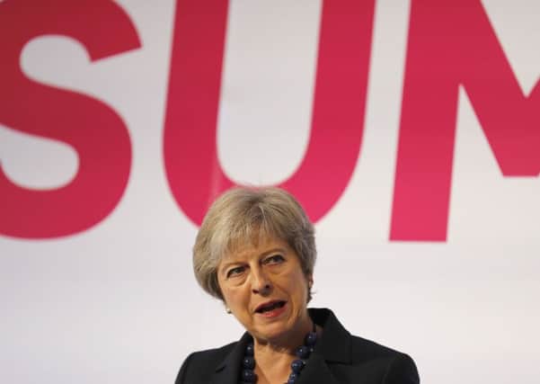 Theresa May, speaking at the National Housing Summit.