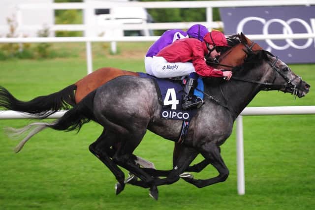 Roaring Lion, the mount of Oisin Murphy, tops the standings for the Cartier Horse of the year after this hard-fought win over Saxon Warrior in the Irish Champion Stakes.