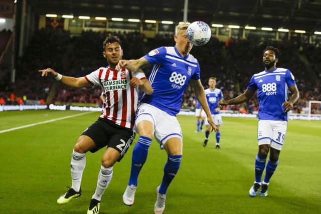 Sheffield United's George Baldock pressures Kristian Pedersen of Birmingham City. Picture: Simon Bellis/Sportimage