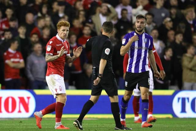 Nottingham Forest's Jack Colback confronts the referee during Wednesday night's clash with Sheffield Wednesday at the City Ground. Picture: Aaron Chown/PA