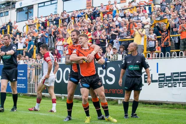 WAY BACK WHEN: Ryan Hampshire is congratulated by then Castleford team-mate Ben Crooks after scoring a try against Catalans Dragons back in July 2016. Picture: Allan McKenzie/SWpix.com