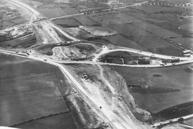 1968: The M1 from Leeds enters the picture from the bottom, and the first intersection is with the A638 Dewsbury (off right) - Wakefield Road, where a link roundabout with M1 is being constructed. The next intersection is with Queens Drive, Ossett.