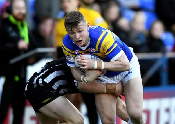BRIGHT FUTURE: 
Leeds Rhinos' Harry Newman, in action against Widnes Vikings earlier this year.
 Picture Jonathan Gawthorpe