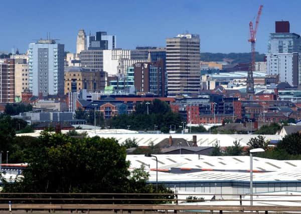 How can cities like Leeds benefit surrounding towns?