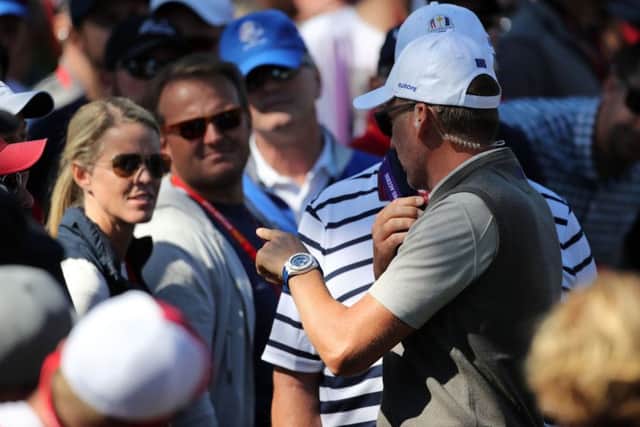 Europe vice captain Ian Poulter speaks with a fans after they heckled Europe's Danny Willett at Hazeltine in 2016. Picture: Peter Byrne/PA