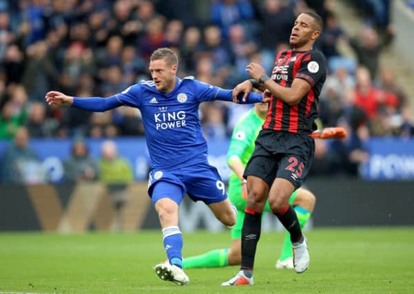Leicester City's Jamie Vardy (left) celebrates scoring his side's third goal of the game.
