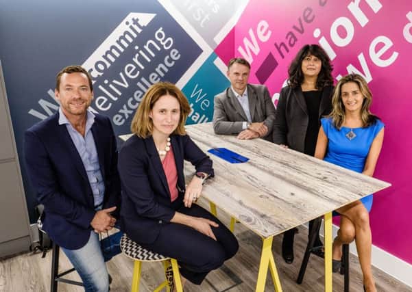 L-R Mark Cooke, chief operating officer, Xalient; Eve Roodhouse, of Leeds City Council; David Baggaley, of Leeds City Council; Dawn Spetale, chief financial officer, Xalient; Sherry Vaswani, chief executive, Xalient.
