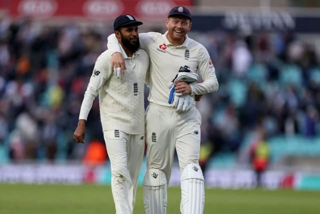 Adil Rashid, with Yorkshire and England team-mate Jonny Bairstow. Picture: Steven Paston/PA