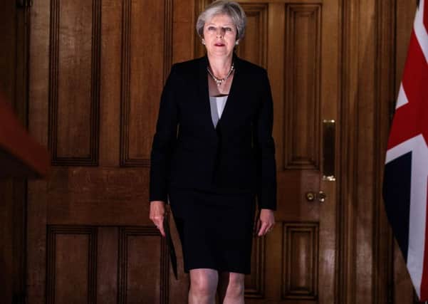 theresa May addresses the nation from 10 Downing Street after being rebuffed by EU leaders.