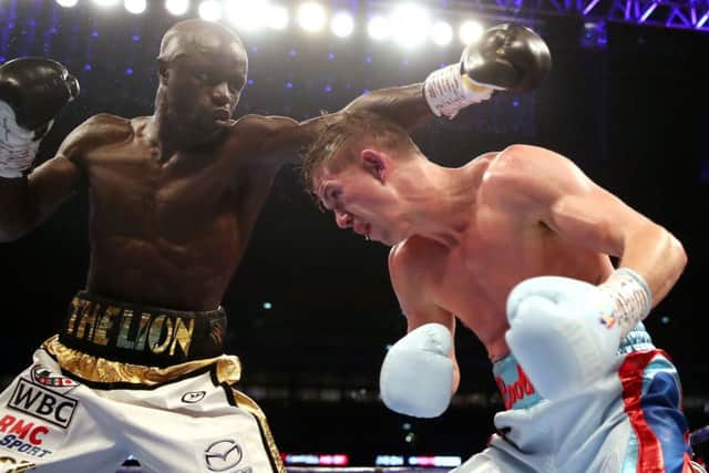 Luke Campbell (right) evades a left jab from Yvan Mendy at Wembley Stadium on Saturday night. Picture: Nick Potts/PA