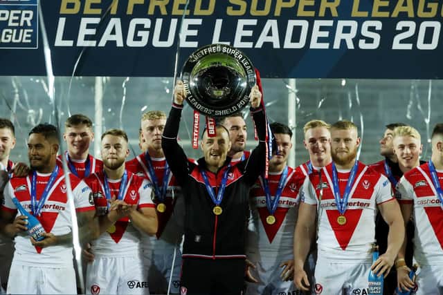 St Helens captain James Roby lifts the League Leaders' Shield recently. (Paul Currie/SWpix.com)