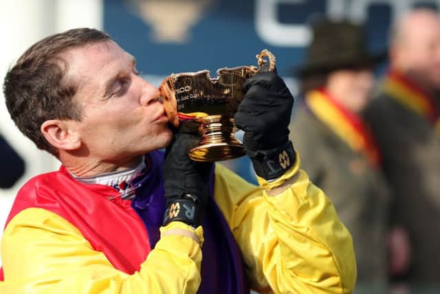 Richard Johnson celebrates his Cheltenham Gold Cup success on Native River.