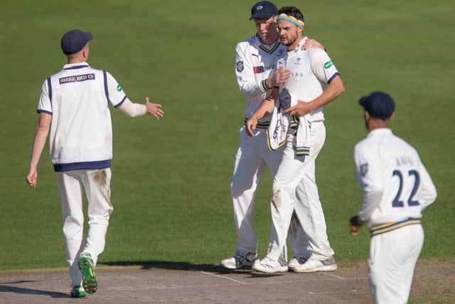 Jack Brooks is lauded by Yorkshire team-mates after taking a wicket on day two against Worcestershire (Picture: John Heald).