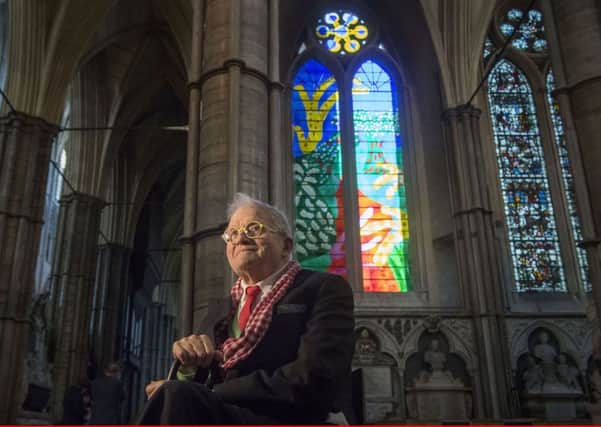 David Hockney in front of The Queen's Window, a new stained glass window at Westminster Abbey he designed and which was created by Barley Studio York, is revealed for the first time.  PIC: PA