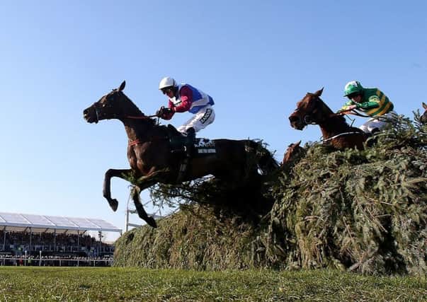 Derek Fox and One For Arthur clear the last in the 2017 Grand National.