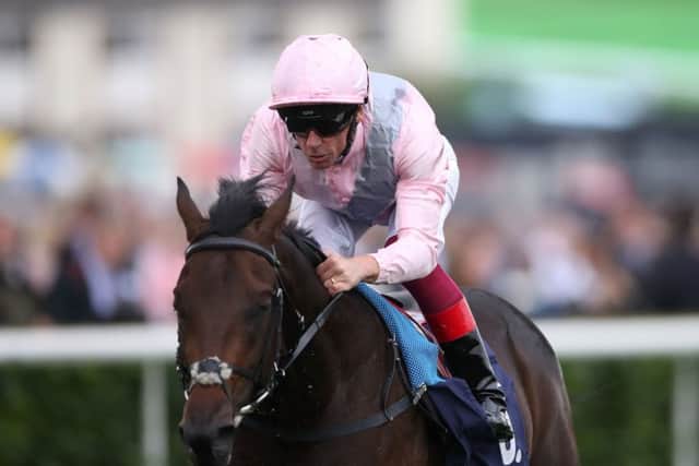 Frankie Dettori and Too Darn Hot surge clear in the Champagne Stakes at Doncaster on St Leger day.