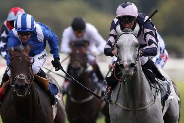 The grey Lord Glitters wins the Strensall Stakes at York under Danny Tudhope.