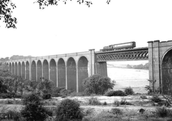 Rare picture of Dearne Valley service crossing Conisbrough viaduct.