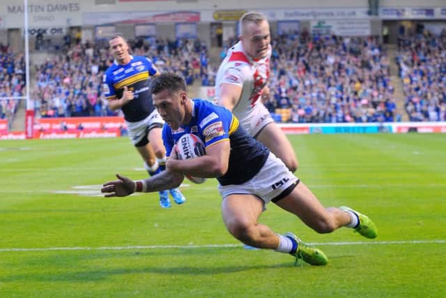 Joel Moon scores a try against St Helens in the Challenge Cup Semi-Final in 2015.