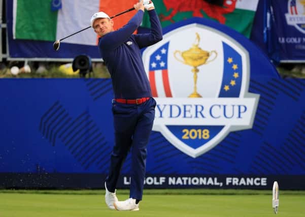 British (and European) golfer Justin Rose tees off on the first hole of the Ryder Cup.