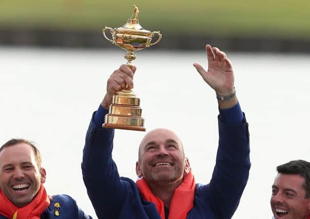 Captain Thomas Bjorn gazes at the Ryder Cup after Europes victory over the United States at Le Golf National (Picture: David Davies/PA Wire).