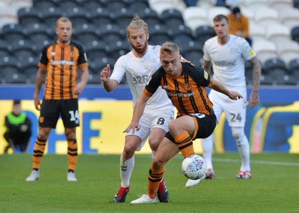 Hull City's Jarrod Bowen holds off Middlesbrough's Adam Clayton..  Picture: Bruce Rollinson