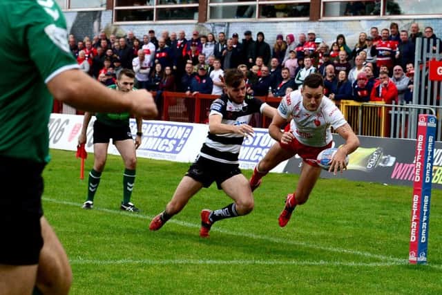 Craig Hall, of Hull Kingston Rovers, scoring a try.