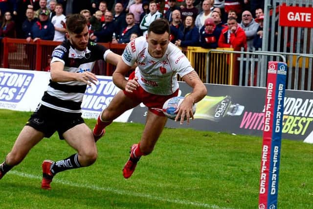 Craig Hall, of Hull Kingston Rovers, scoring a try.