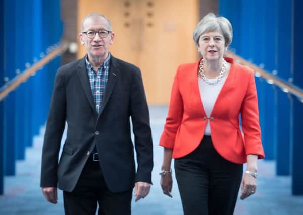 Prime Minister Theresa May and her husband Philip arriving for the Conservative Party annual conference at the International Convention Centre, Birmingham.