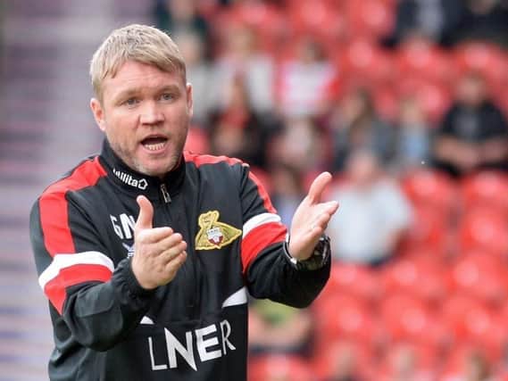 Doncaster Rovers moved up to third in League One on Saturday