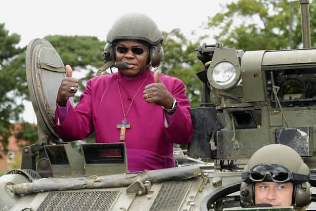 File photo dated 06/09/09 of the Archbishop of York Dr John Sentamu riding in an armoured vehicle from the Garrison Church at Strensall Barracks, where he met soldiers injured in conflict.