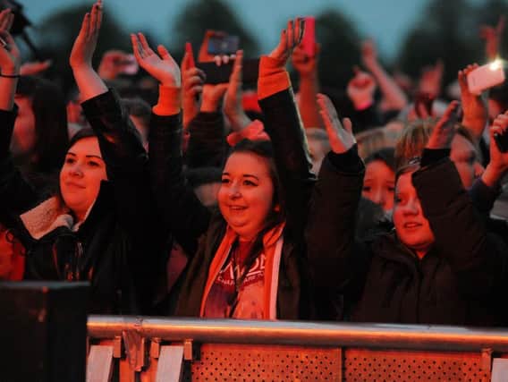 Clapping has been banned by a student union. Photo: The crowd clap along at an unrelated gig in Doncaster. Picture: Andrew Roe